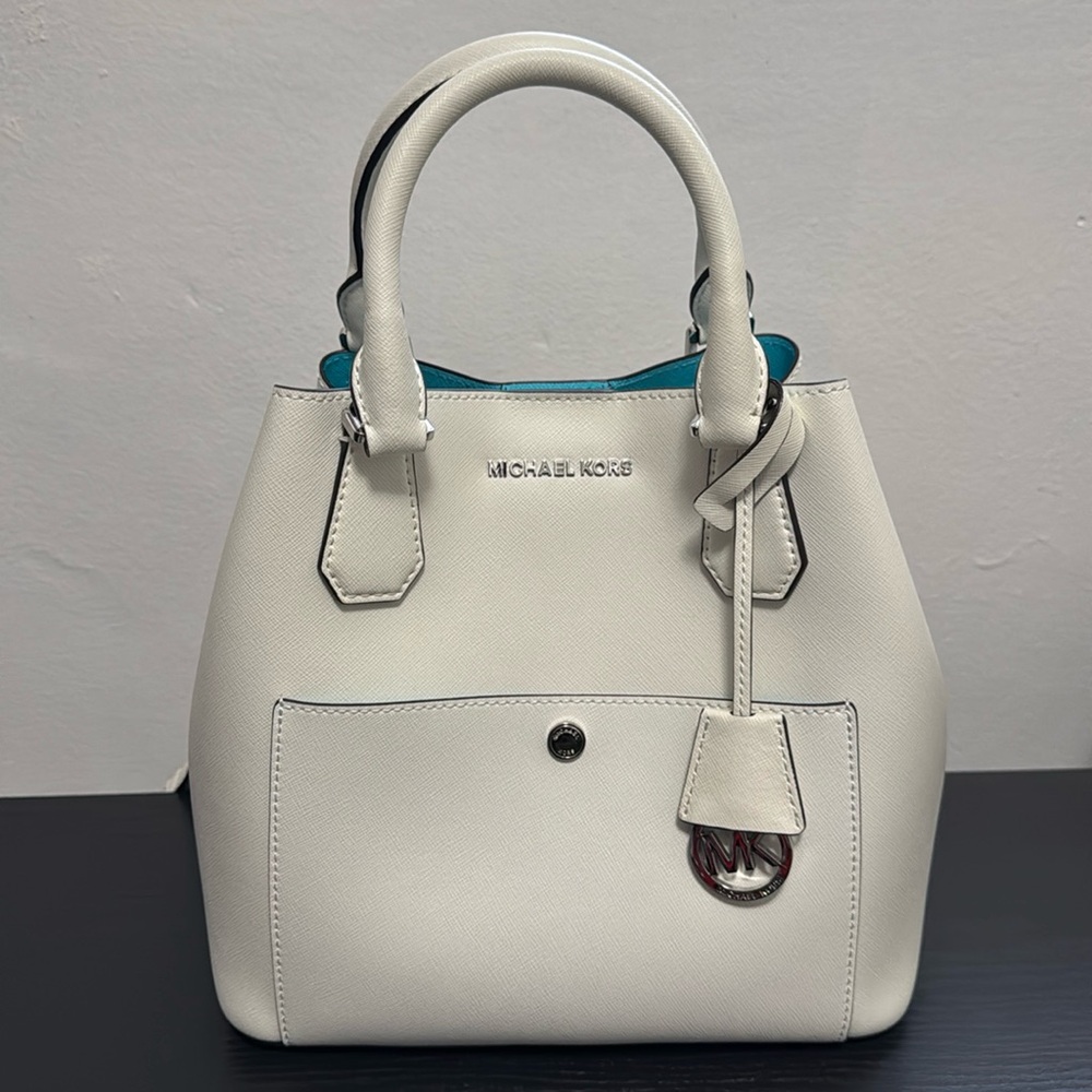 Michael Kors; name style of bag: Greenwich; size: large.